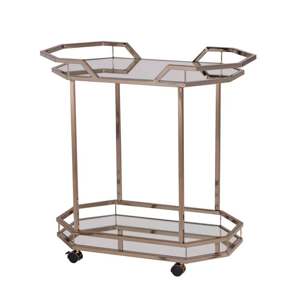 Champagne iron and mirrored glass octagonal rolling bar cart with two shelves and wheels on a white background.