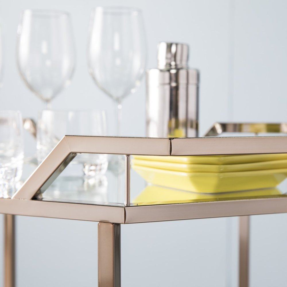 31" Champagne Iron and Mirrored Glass Octagonal Rolling Bar Cart. Bar cart isolated on a plain white background, finished in tan glass.