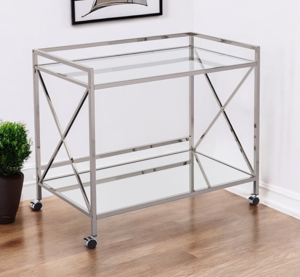 Cropped view of 39" Silver Metal and Glass Rolling Bar Cart focusing on the silver glass surface.