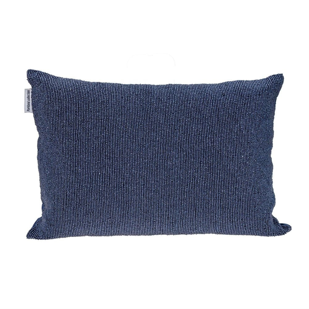 A navy blue beaded throw pillow with a white tag that reads "Parkland Collection" on a white background.