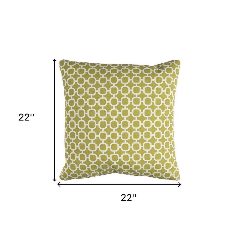 22" Green and White Quatrefoil Indoor Outdoor Throw Pillow. Outdoor pillow isolated on a plain white background, showing a white cotton surface.