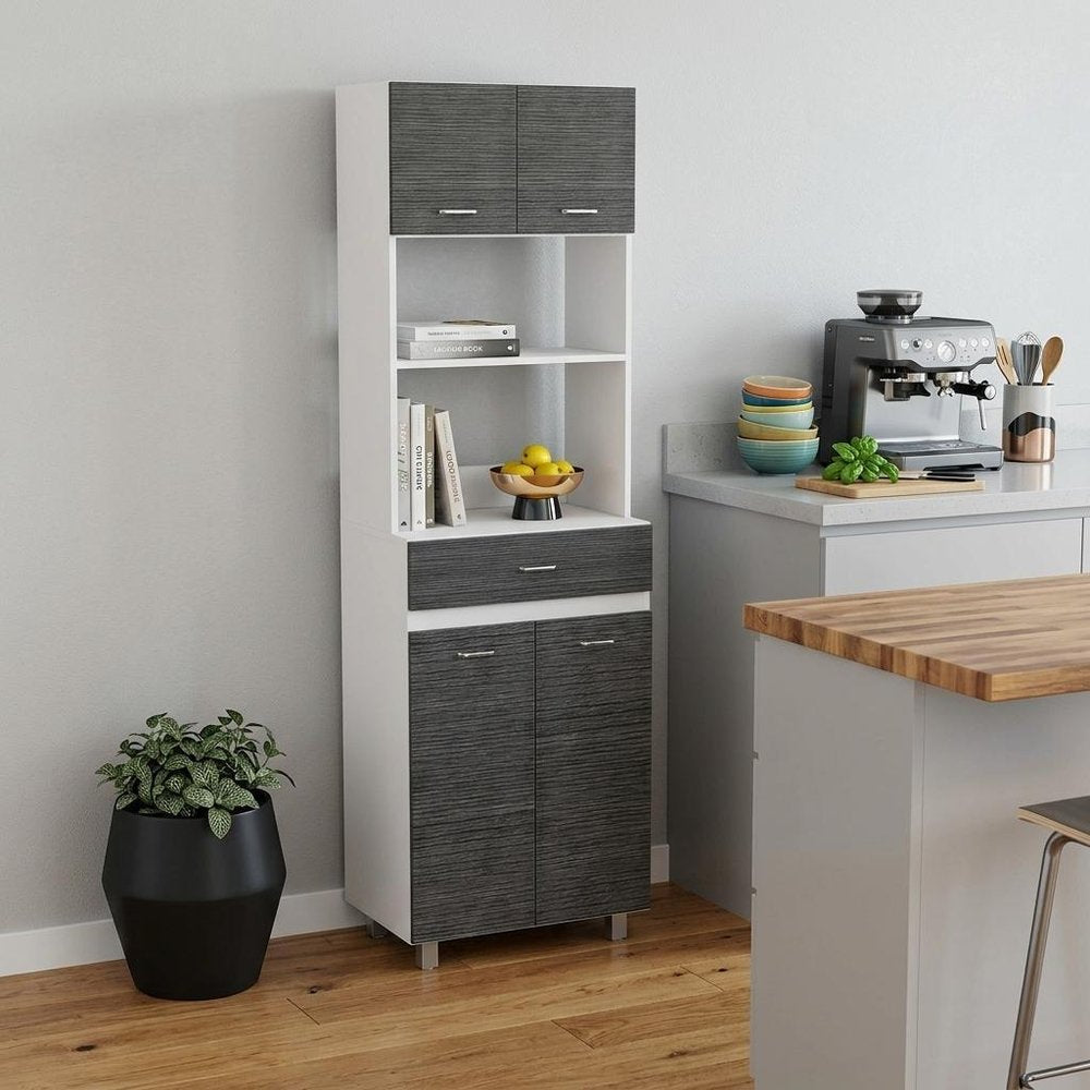24" White and Gray Wood Flat Door Kitchen Cart With Storage styled in a furnished interior with an off-white wall on a wood floor.