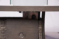 Gray Wicker Outdoor Gas Fire Pit Table with Ice Bucket in a home interior