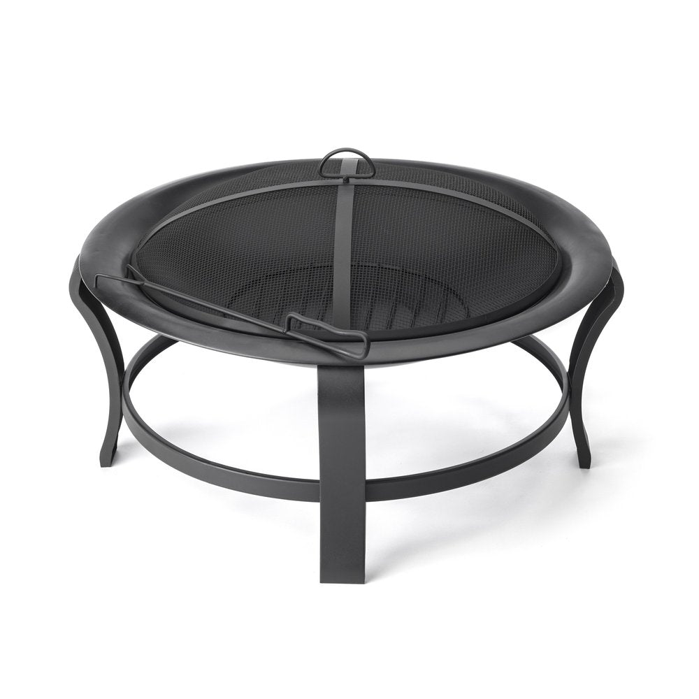 Black steel round wood burning fire pit with mesh lid and poker on a white background.