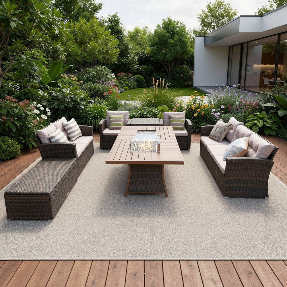 Seven Piece Brown and Gray Wicker Sectional Seating Group With Fire Pit And Table