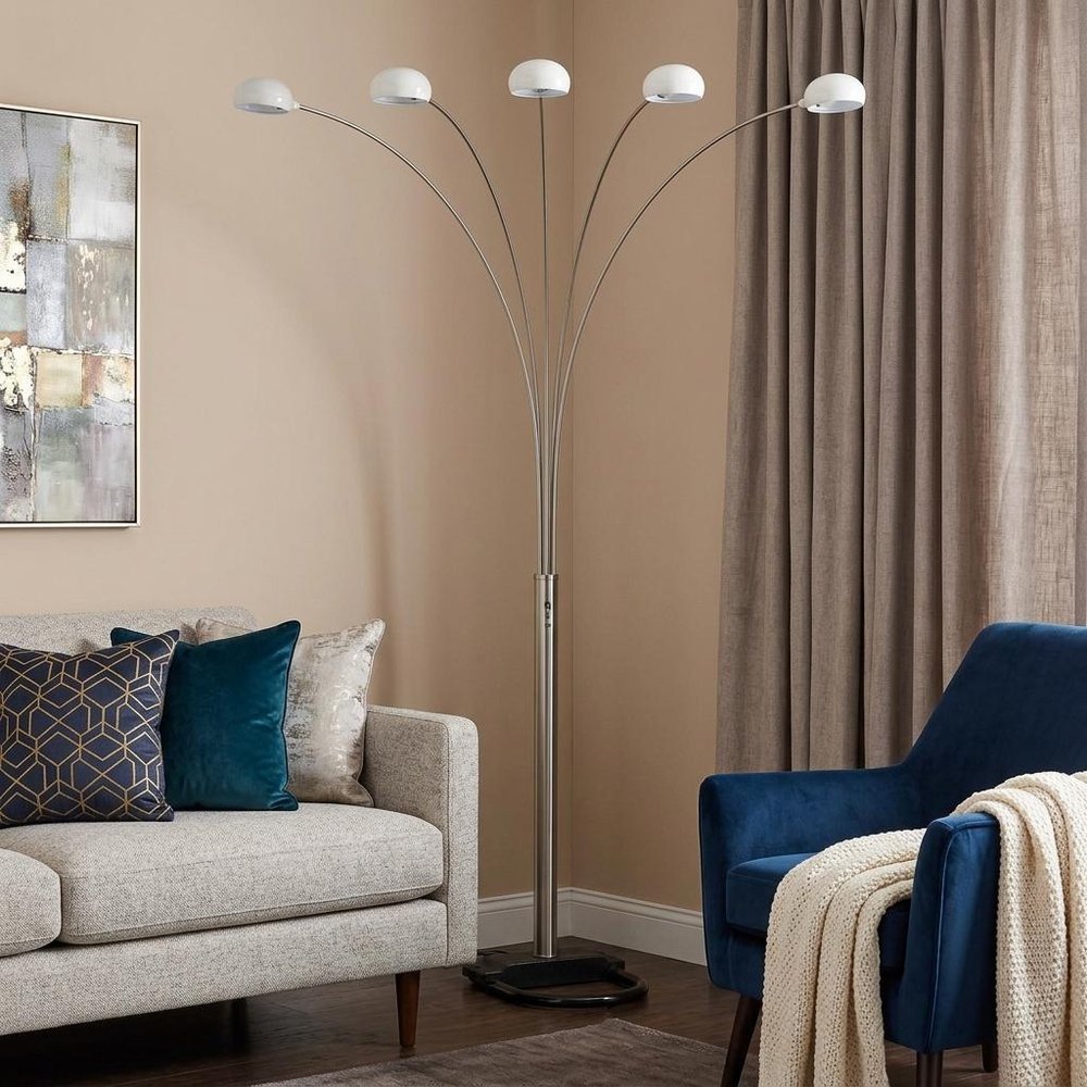 84" White Five Light Arc Floor Lamp With White Dome Shade in a home interior