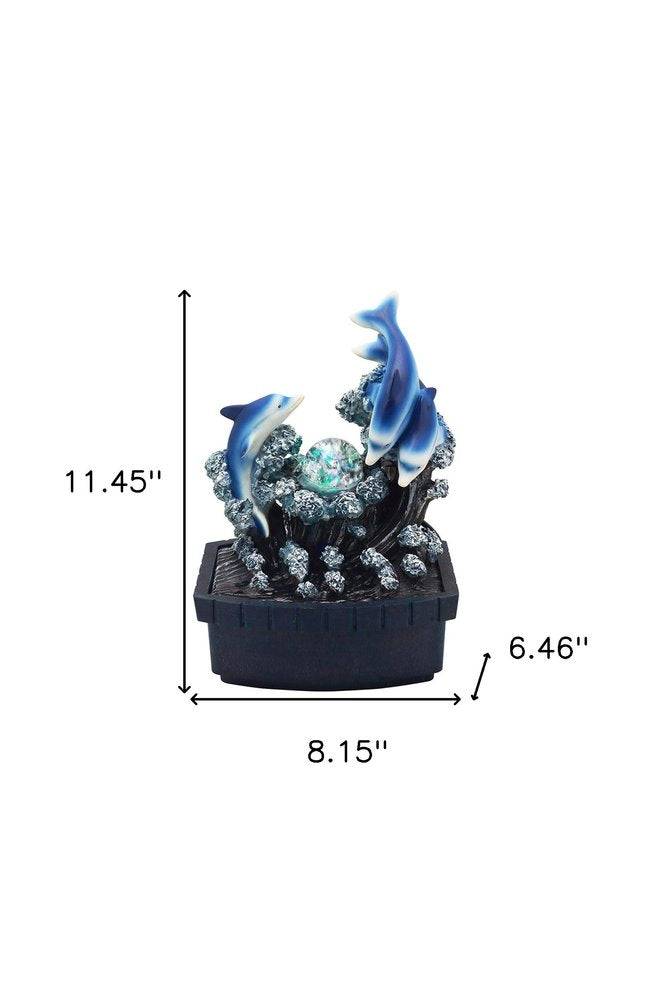 11" Blue Polyresin Dolphins Tabletop Fountain. Home product isolated on a plain white background, showing a blue resin surface.