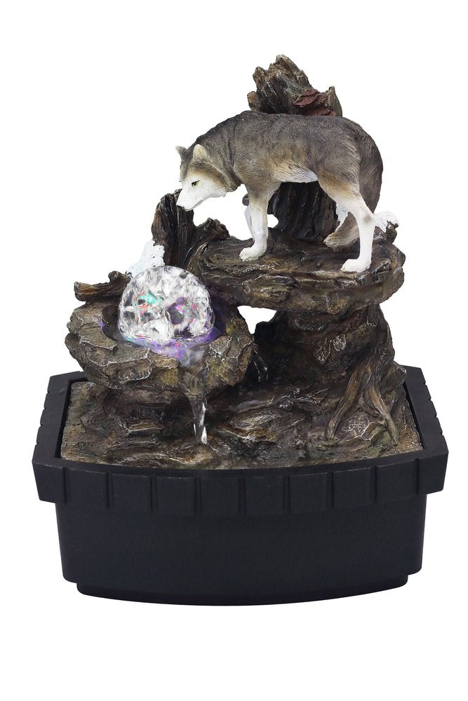 10" Black Polyresin Wolf Tabletop Fountain Sculpture. Sculpture isolated on a plain white background, showing a black resin surface.