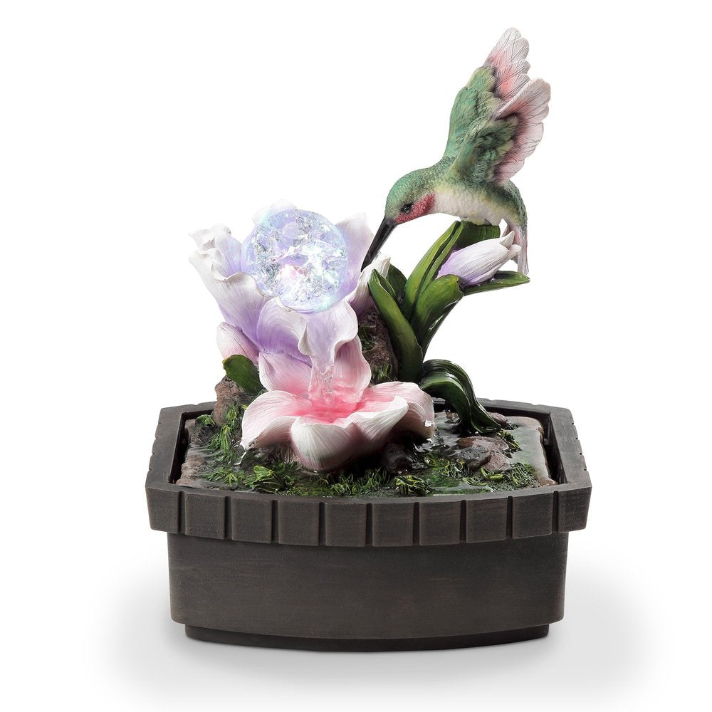 11" Pink Green And Brown Polyresin Hummingbird Tabletop Fountain. Home product isolated on a plain white background, showing a resin surface.