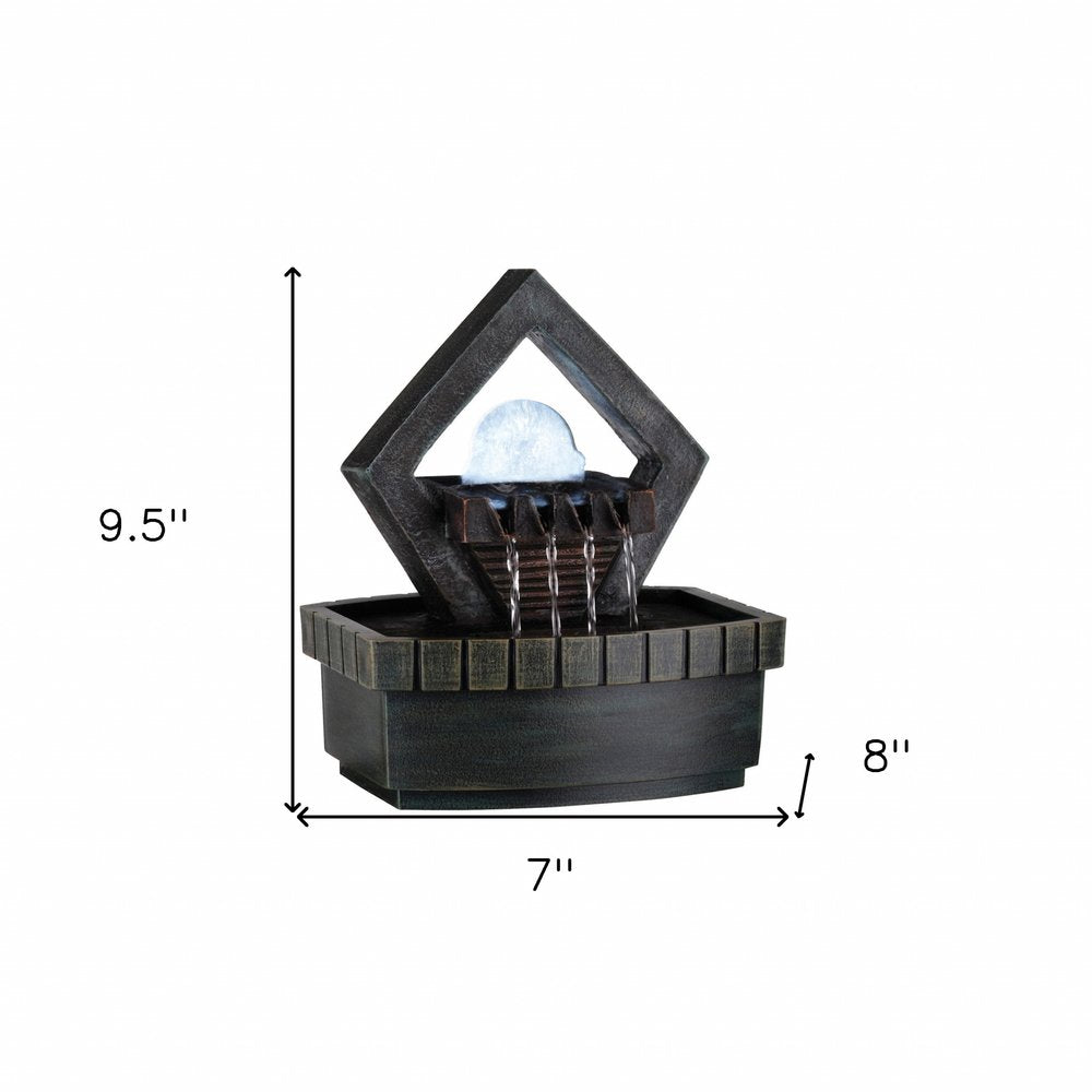 10" Brown Polyresin Geo and Pebbles Tabletop Fountain with LED Light. Home product isolated on a plain white background, showing a resin surface.