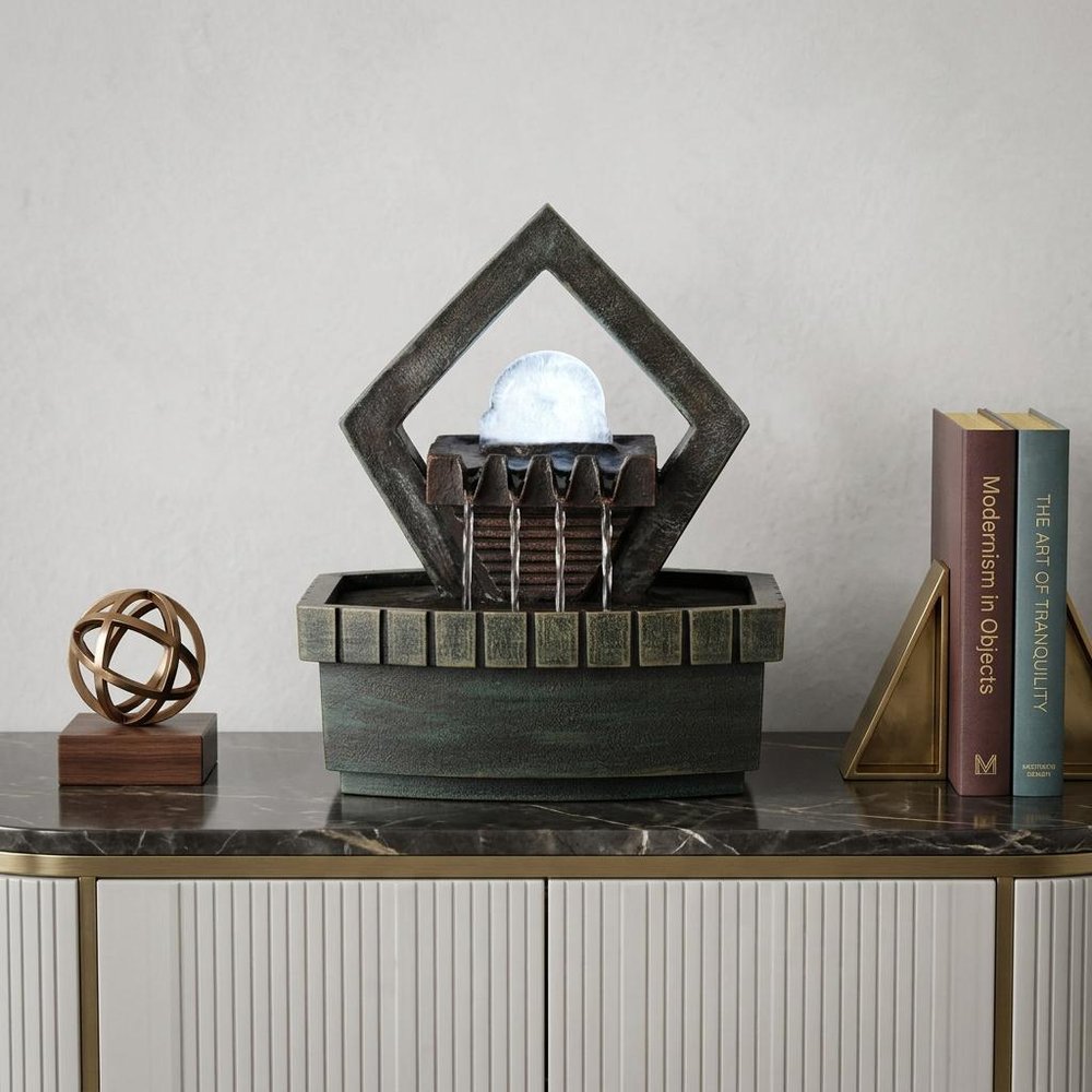 10" Brown Polyresin Geo and Pebbles Tabletop Fountain with LED Light. Home product isolated on a plain white background, showing a resin surface.