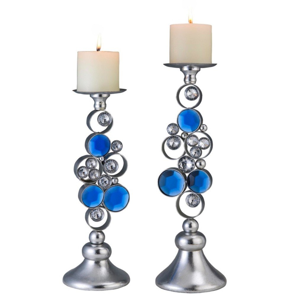 Set Of Two Silver and Blue Bling Tabletop Pillar Candle Holders on a white background