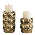 Set Of Two Antiqued Brass Tabletop Pillar Candle Holders on a white background