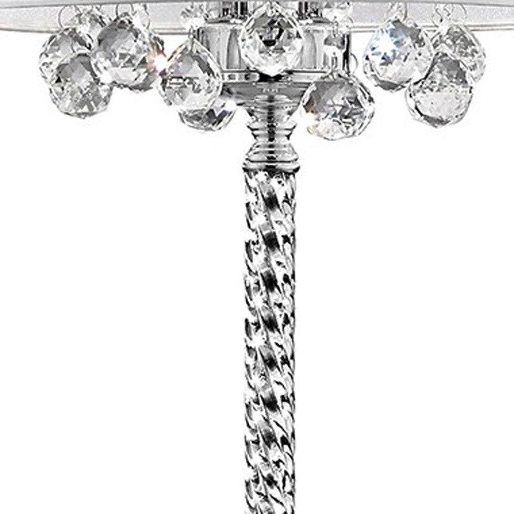 63" Silver Three Light Candelabra Floor Lamp With White Fabric Drum Shade. Floor lamp isolated on a plain white background, finished in silver metal.
