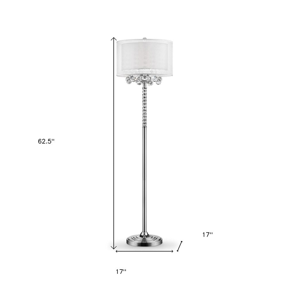 63" Silver Three Light Candelabra Floor Lamp With White Fabric Drum Shade. Floor lamp isolated on a plain white background, finished in silver metal.