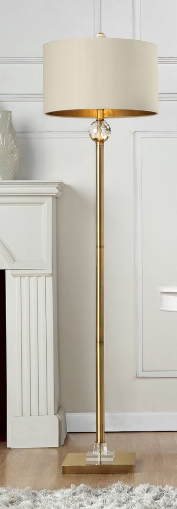 63" Gold Column Floor Lamp With Off White Metal Drum Shade. Floor lamp isolated on a plain white background, finished in off-white metal.