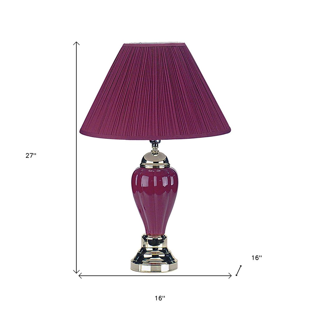 27" Silver Ceramic Bedside Table Lamp With Magenta Empire Shade. Table lamp isolated on a plain white background, showing a silver ceramic surface.