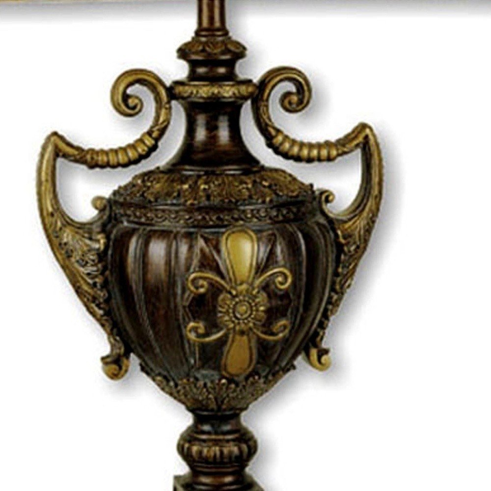 31" Gold Bedside Lamp With Bell Shade. Lamp isolated on a plain white background.