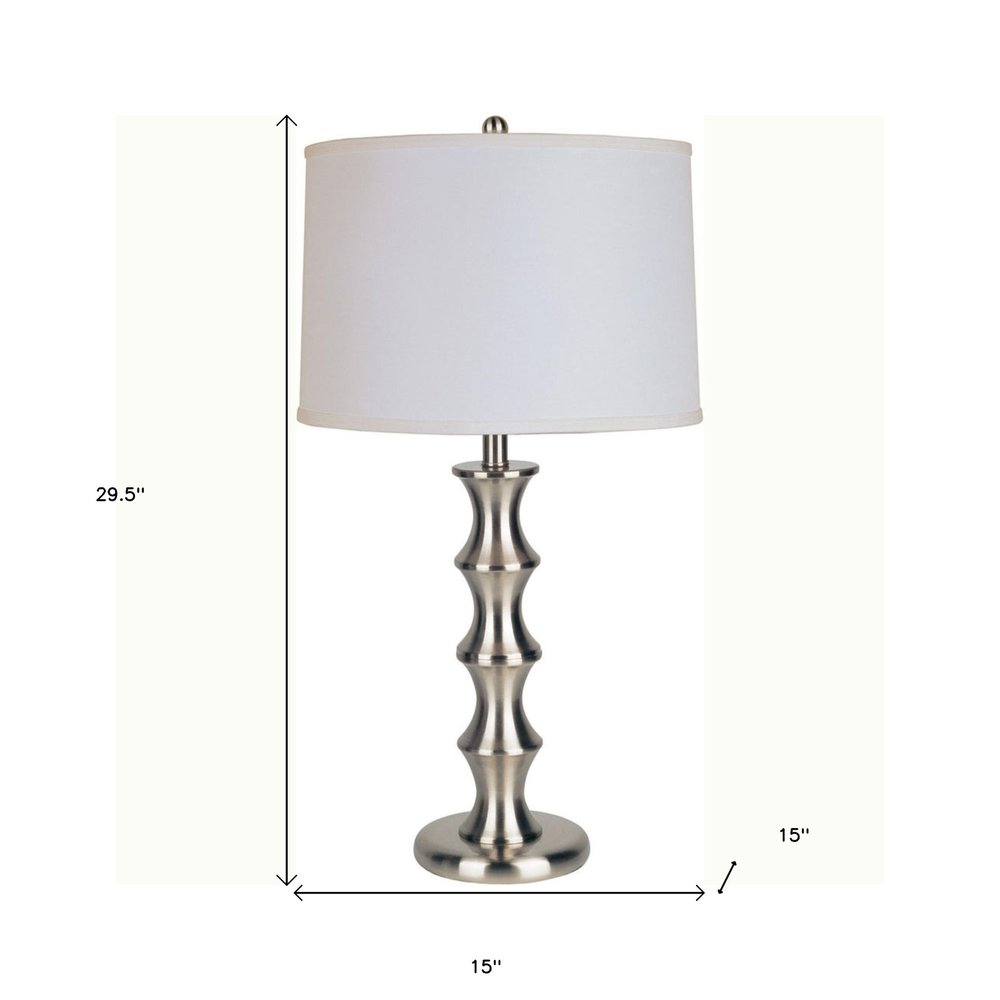 30" Black Solid Wood Bedside Table Lamp With White Shade. Table lamp isolated on a plain white background, showing a white wood surface.