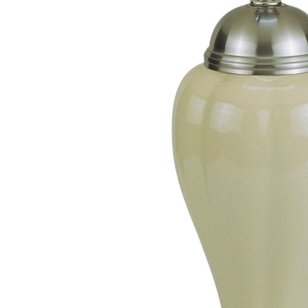 27" Gray and Silver Metal Urn Table Lamp With Gray Empire Shade. Table lamp isolated on a plain white background, showing a silver metal surface.