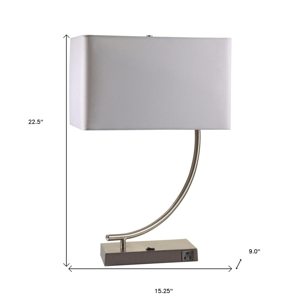 23" Silver Curved Table Lamp With White Rectangle Shade. Table lamp isolated on a plain white background, finished in silver.