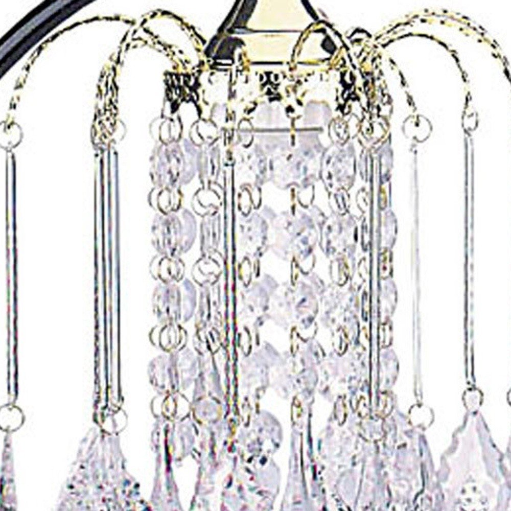 27" Black and Gold Metal Faux Crystal Chandelier Table Lamp. Chandelier isolated on a plain white background, showing a crystal surface.