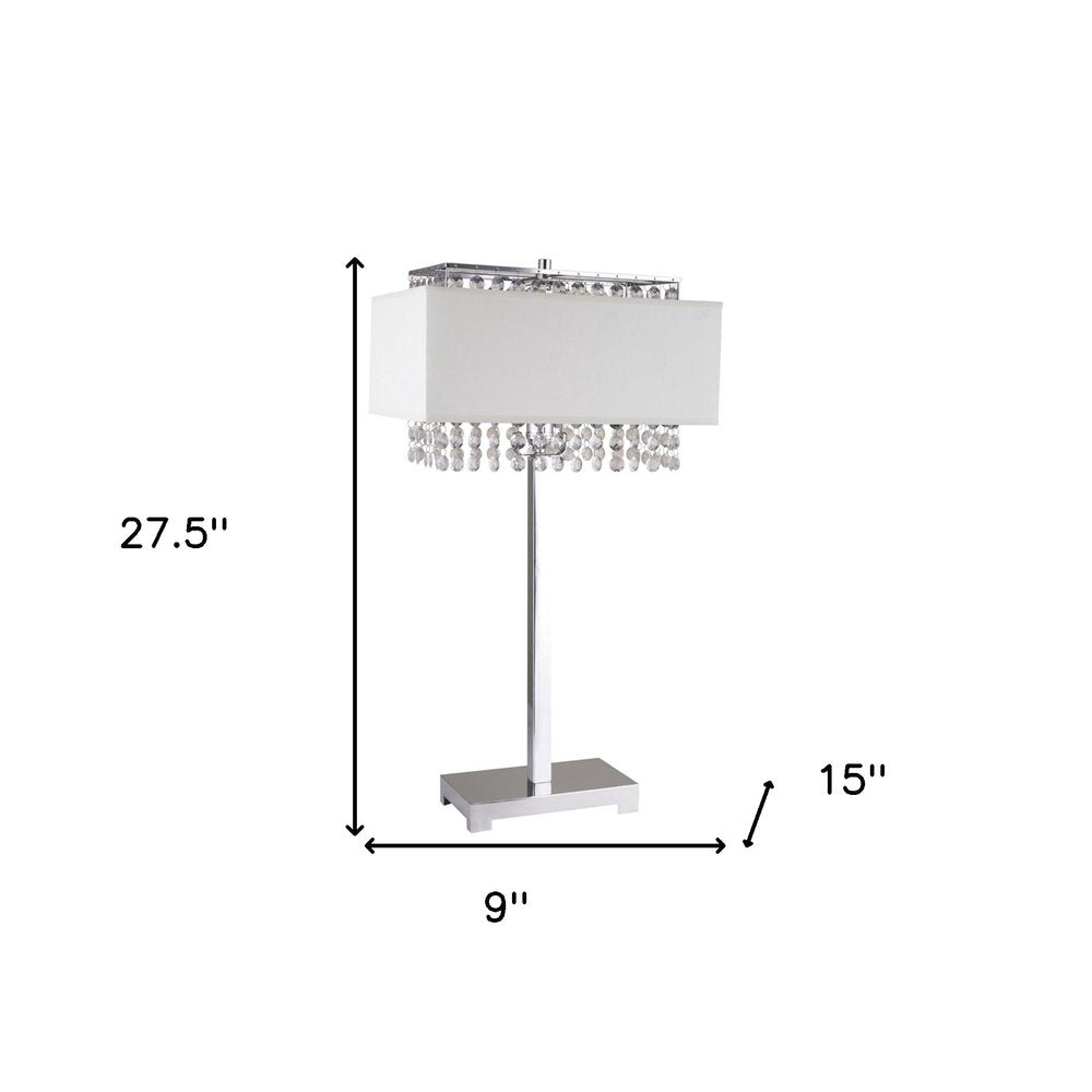 28" Silver Table Lamp With Faux Crystals and White Rectangle Shade. Table lamp isolated on a plain white background, in a silver crystal finish.