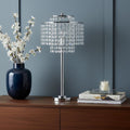26" Silver Glam Two Tier Chandelier USB Table Lamp shown outdoors on an outdoor setting.