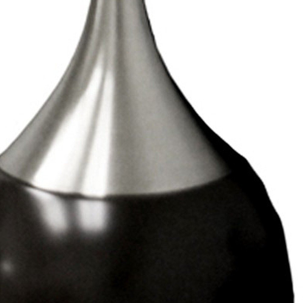 25" Black and Silver Gourd Table Lamp With White Tapered Drum Shade. Table lamp isolated on a plain white background, showing its silver color.
