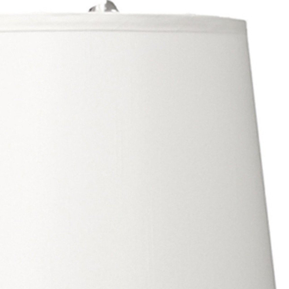 25" Silver Metal Gourd Table Lamp With White Tapered Drum Shade. Table lamp isolated on a plain white background, in a silver metal finish.