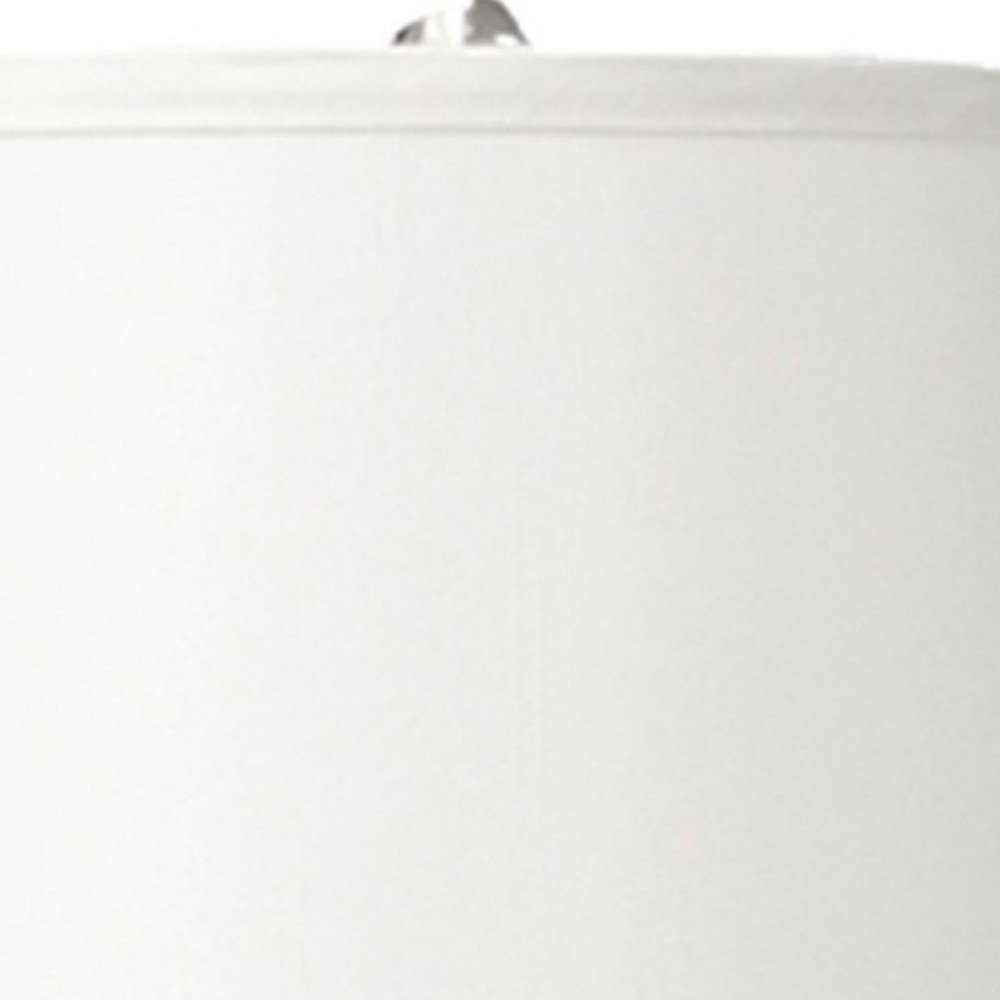 25" Silver Metal Gourd Table Lamp With White Tapered Drum Shade. Table lamp isolated on a plain white background, finished in silver metal.
