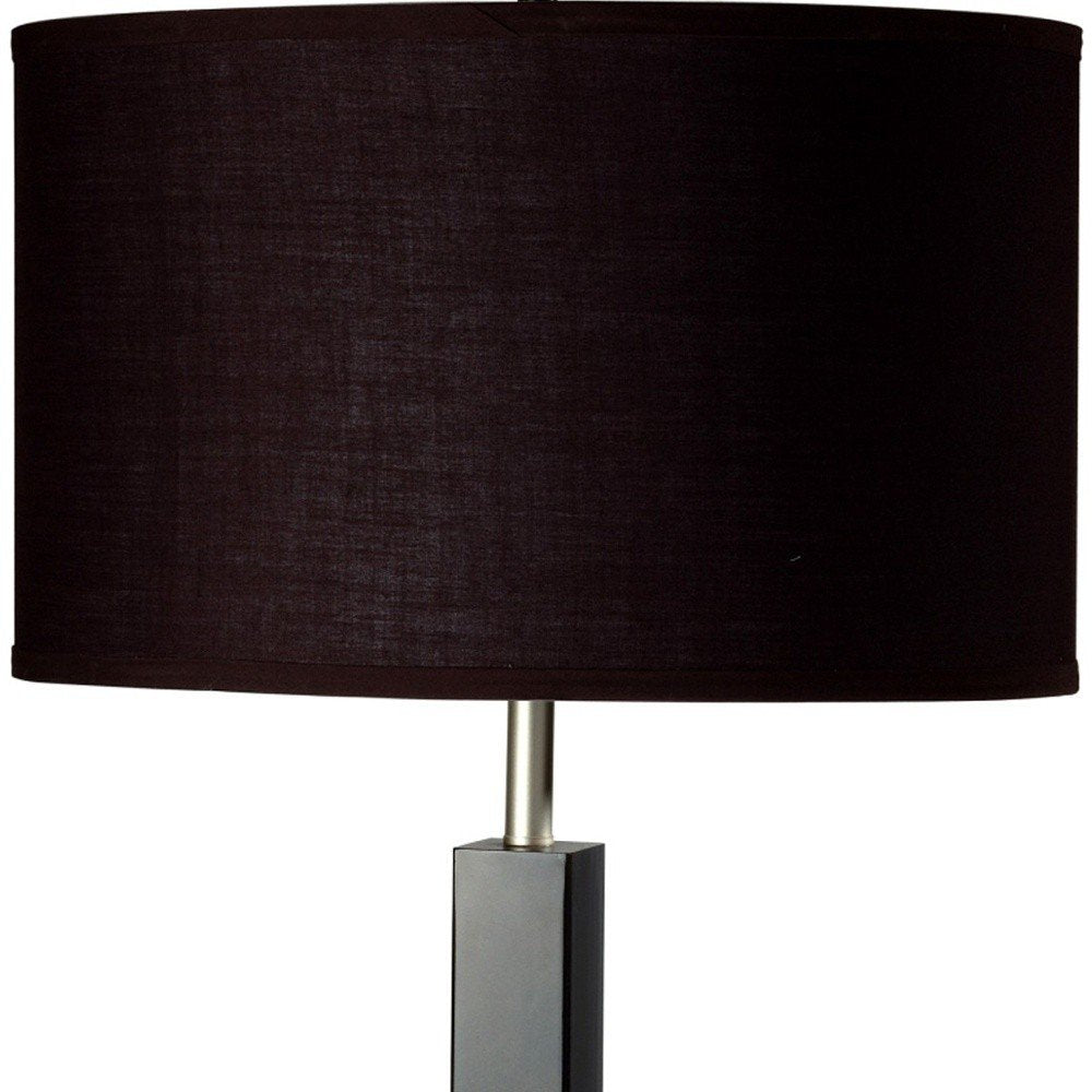 30" Black Polyresin Table Lamp With Brown Classic Drum Shade photographed against a dark studio background in black.