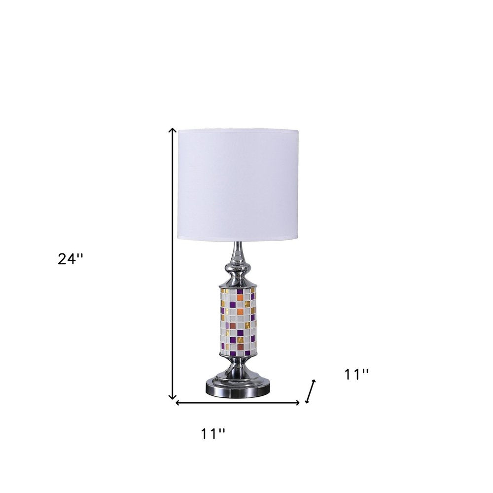 24" Silver Bedside Table Lamp With White Drum Shade. Table lamp isolated on a plain white background, finished in silver.