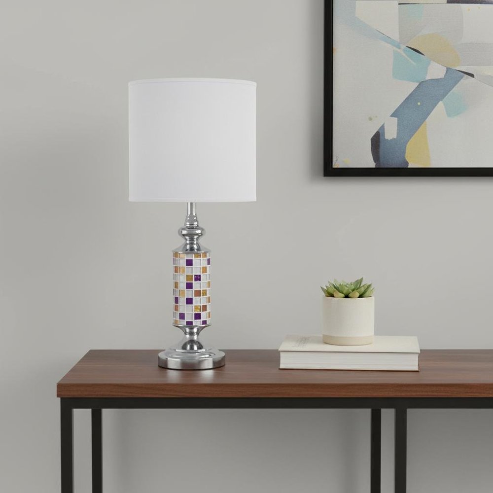 24" Silver Bedside Table Lamp With White Drum Shade. Table lamp isolated on a plain white background, finished in silver.