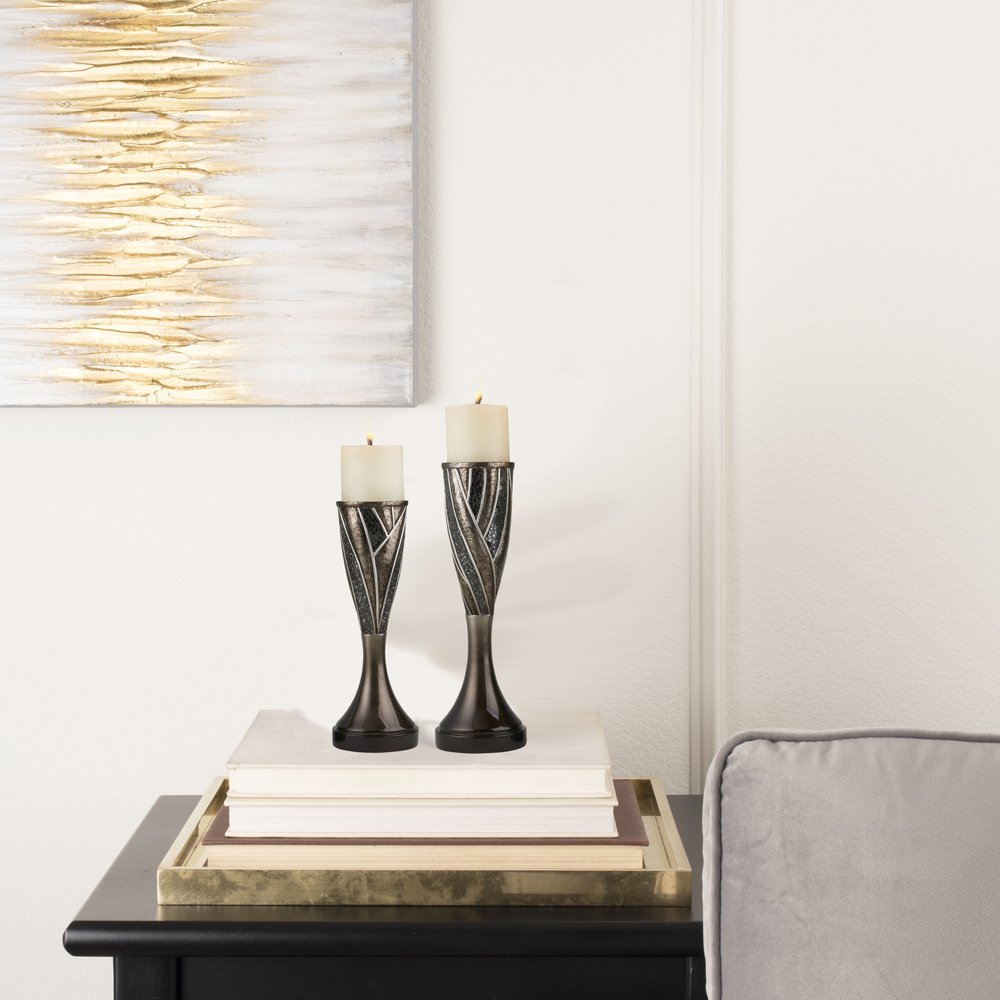 Set of Two Black Silver and Bronze Polyresin Abstract Centerpiece Pillar Candle Holders With Candle on a white background