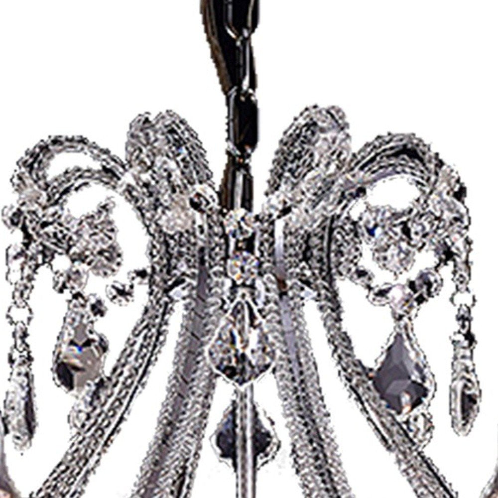 Candle Style Empire Eight Light Transparent Glass Led Ceiling Light on a white background