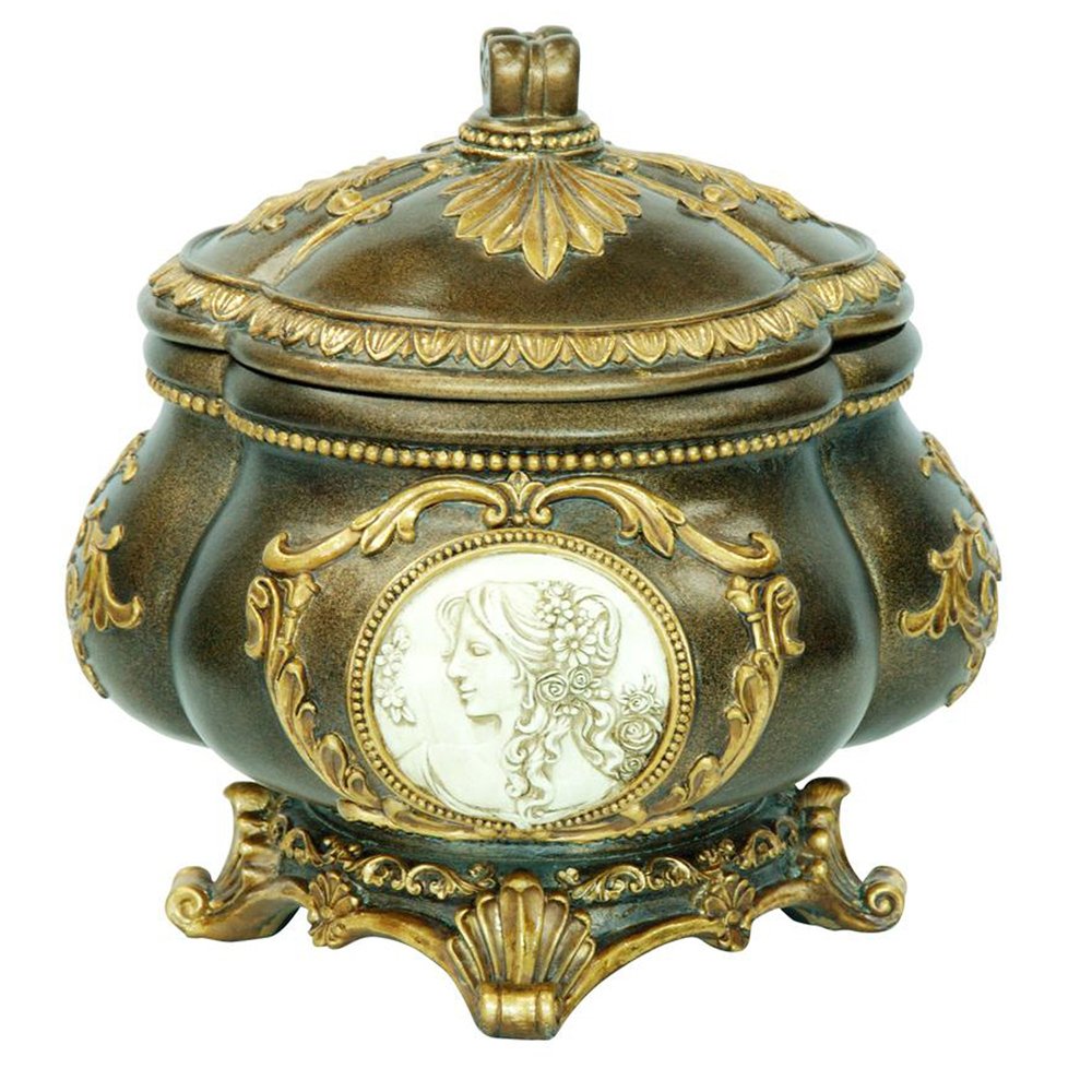 Bronze and gold ornate jewelry box with a cameo of a woman and floral accents on a white background.