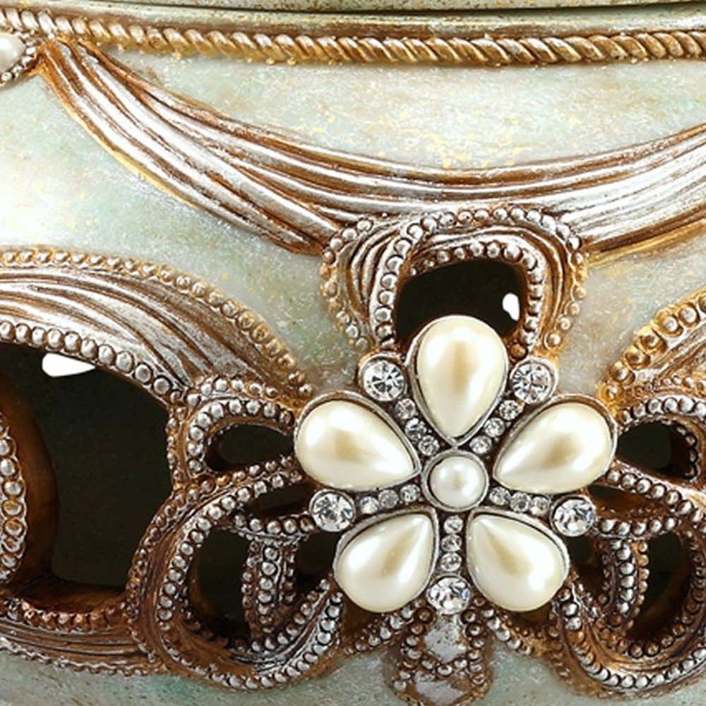 9" Bronze Gold And Light Green Resin Floral Scroll Jewelry Box With Gemstones and Crystals in a home interior