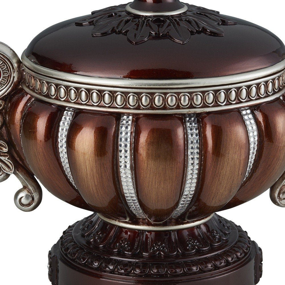 13" Bronze Red And Silver Resin Floral Scroll Jewelry Box With Metal Accents detail shot of the red metal finish.