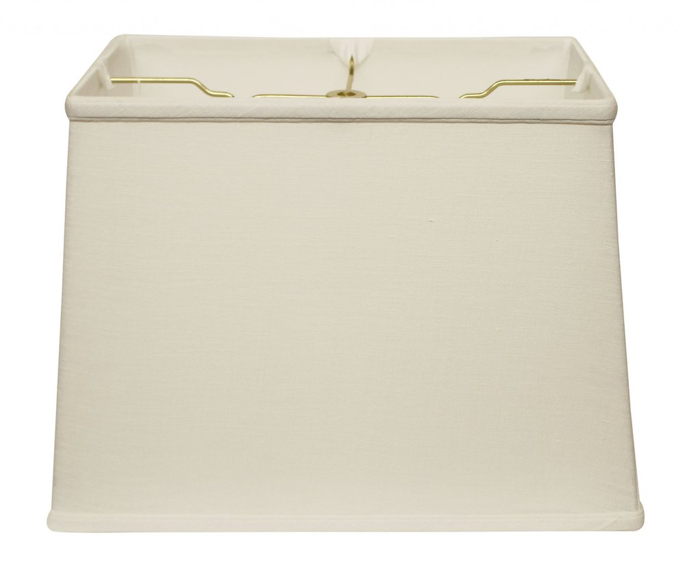 Rectangular white linen lampshade with gold harp visible inside against a white background.