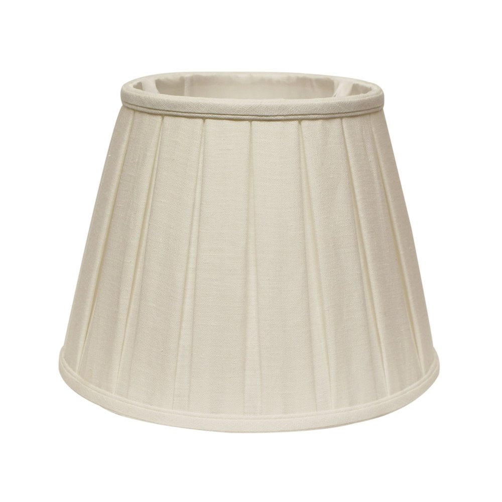 White linen pleated empire lamp shade on a white background.