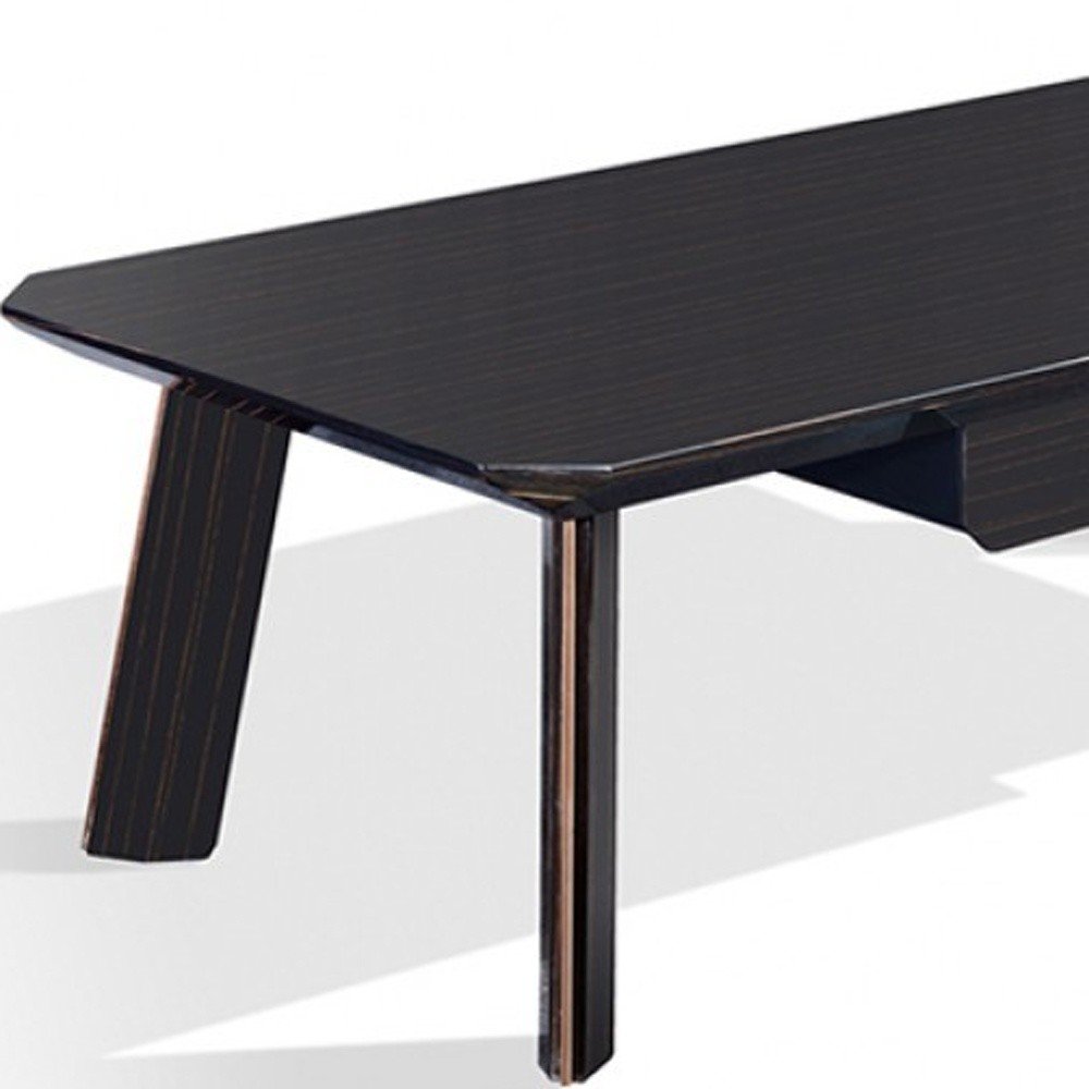 55" Ebony and Dark Brown Wood And Stainless Steel Coffee Table With Drawer. Coffee table isolated on a plain white background, showing a dark brown metal surface.