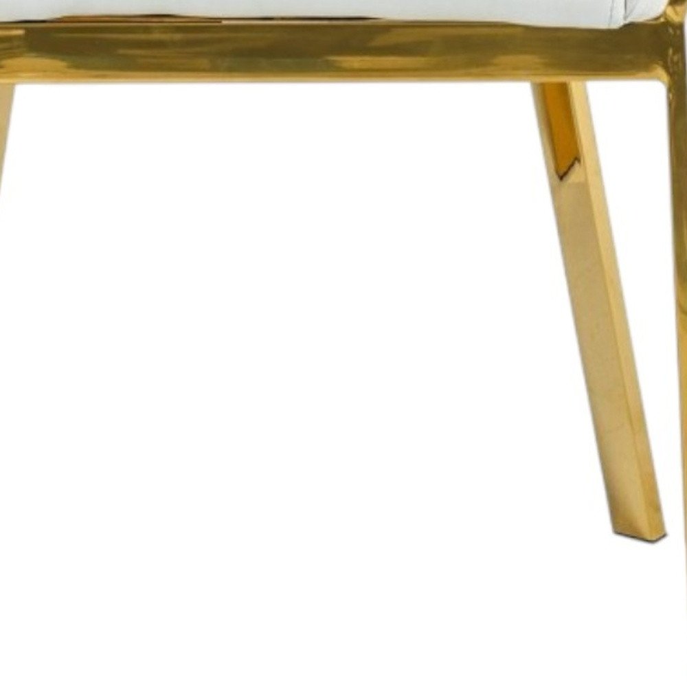 White and Gold Upholstered Faux Leather Dining Arm Chair on a white background