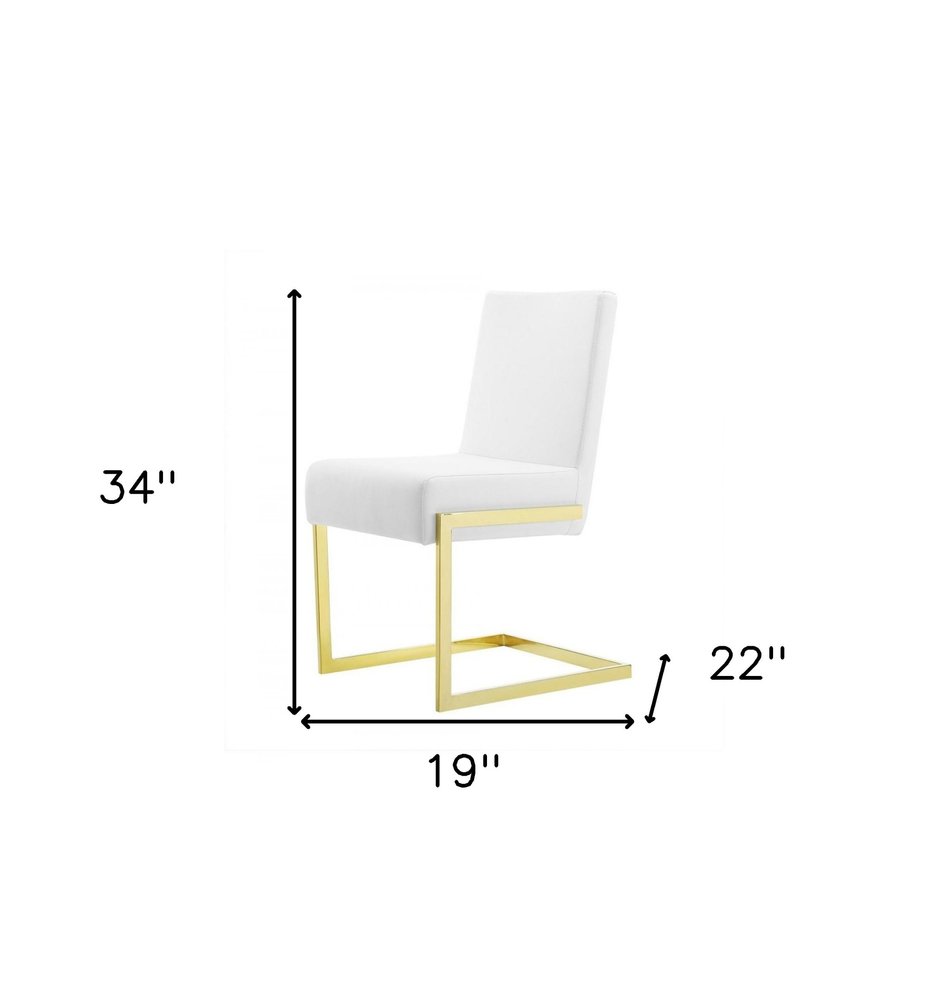 Set of Two White and Gold Upholstered Faux Leather Dining Side Chairs on a white background