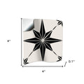 4" x 4" black and white mono cross peel and stick tile with a starburst design on a white background.