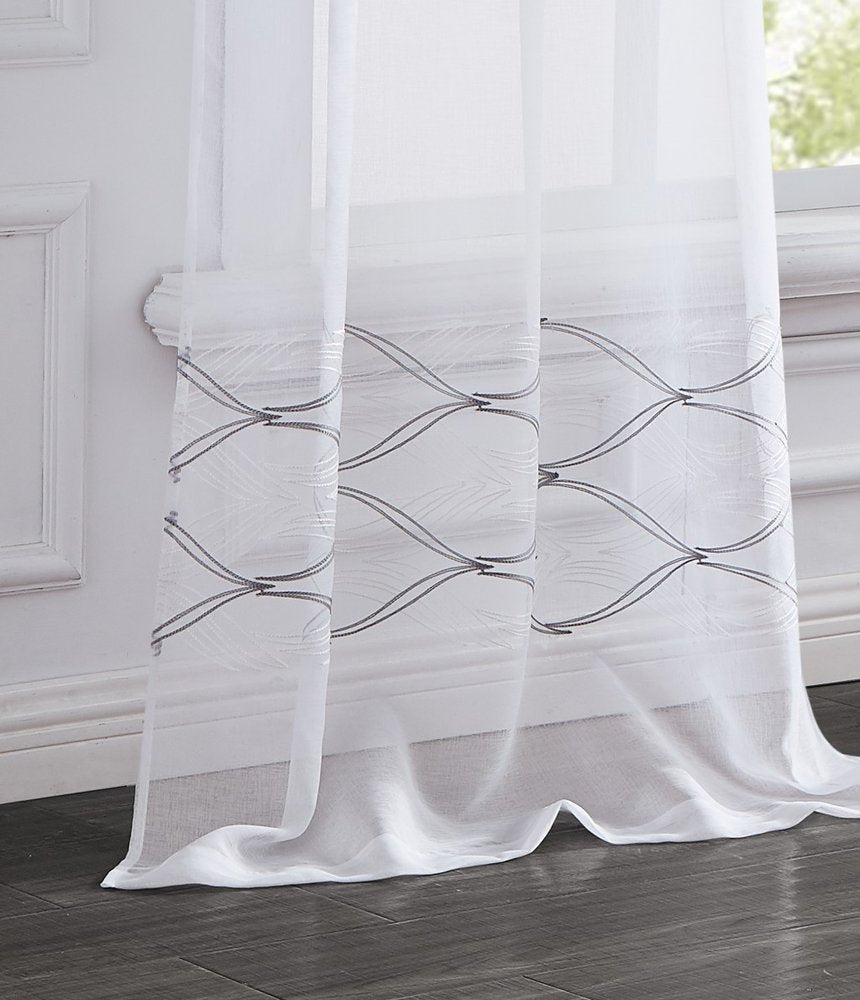 Set of Two 96" White Wave Embroidered Window Panels in a home interior
