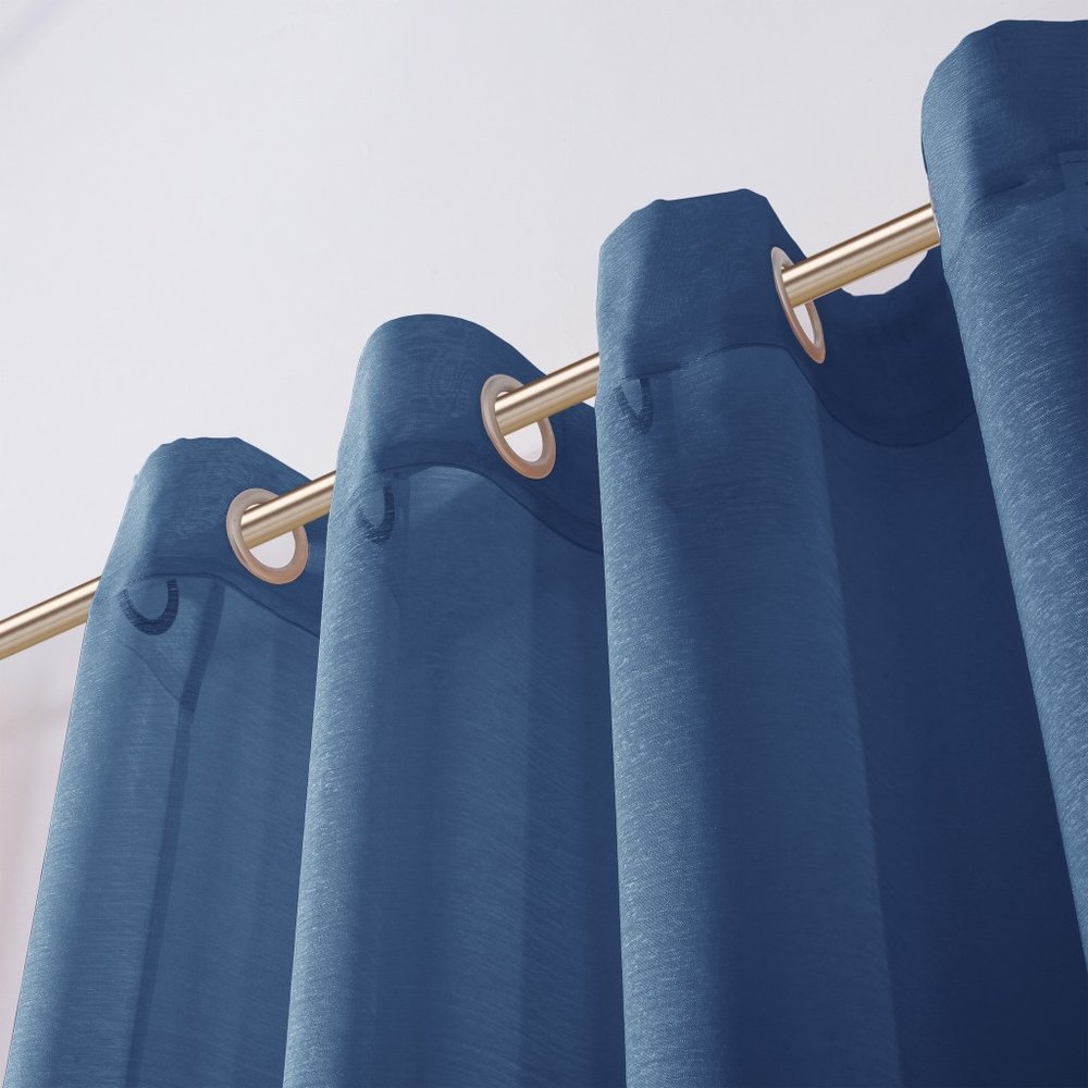 Set of Two 84" Blue Solid Modern Window Panels in a home interior