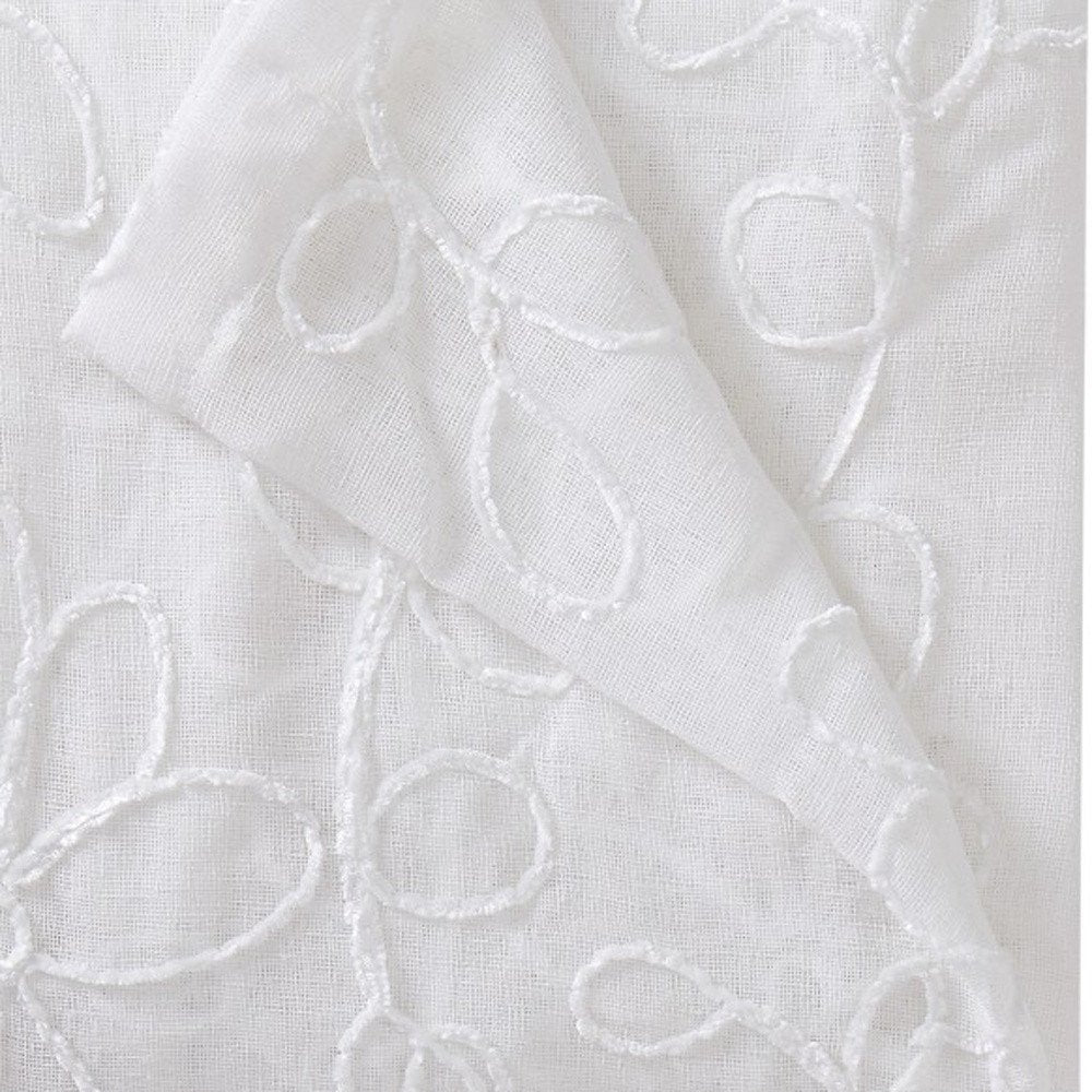 Set of Two 84" White Floral Embroidered Window Panels on a white background