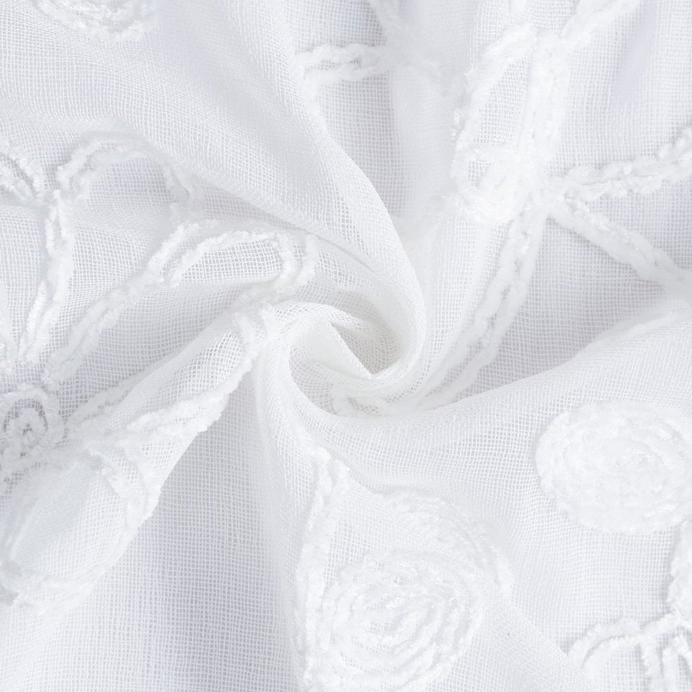 Set of Two 84" White Floral Embroidered Window Panels on a white background