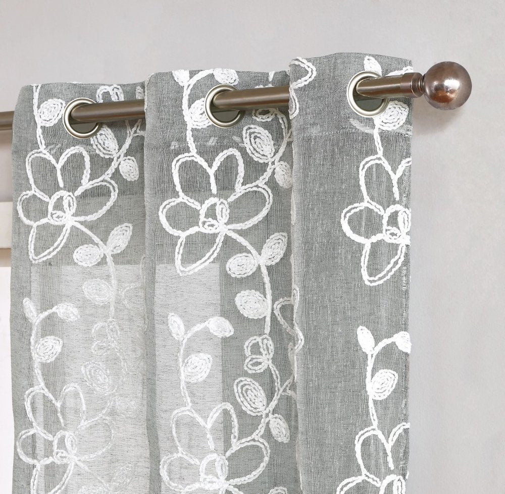 Set of Two 96" Silver Floral Embroidered Window Panels on a white background